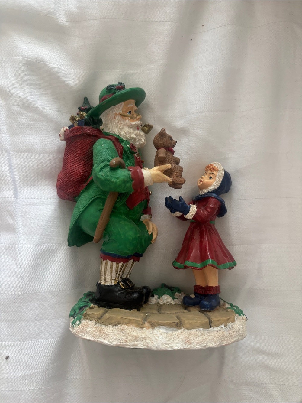 Festive Santa and Child Holiday Figurine in Green and Red